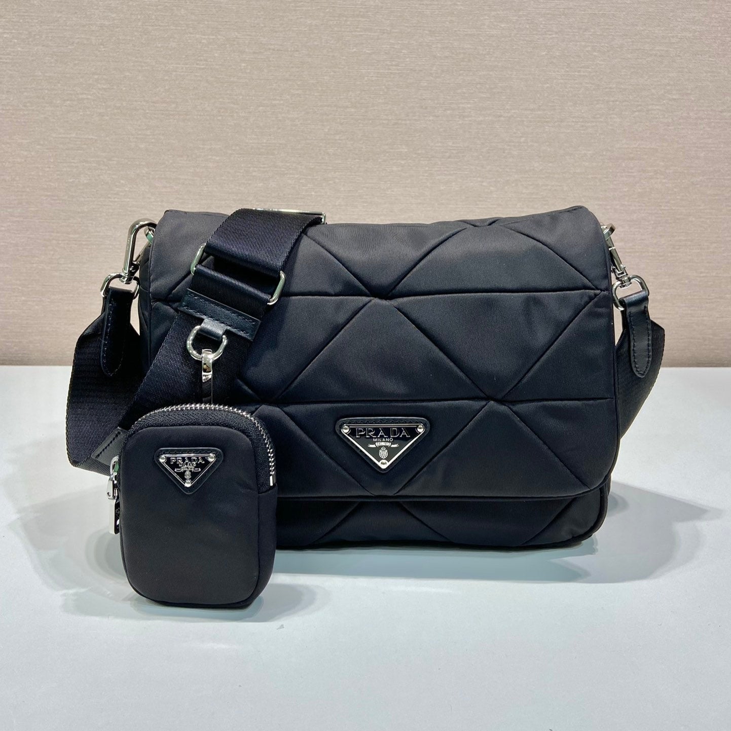 PRADA MEDIUM FLAP BAG 24 IN BLACK TRIANGULAR QUILTED PATTERN RE-NYLON