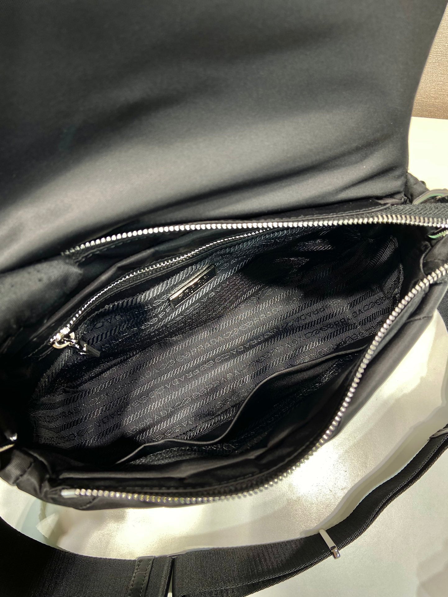 PRADA MEDIUM FLAP BAG 24 IN BLACK TRIANGULAR QUILTED PATTERN RE-NYLON