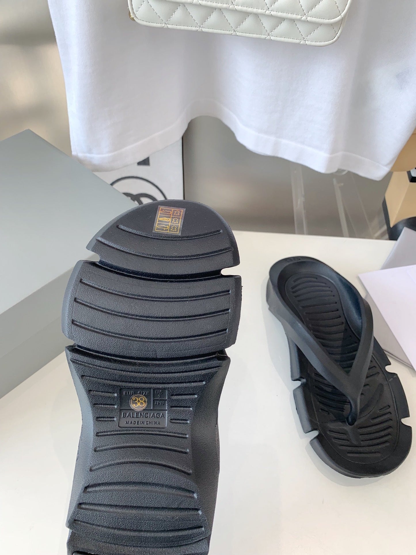 Balanciaga THONG SANDALS IN BLACK RUBBER