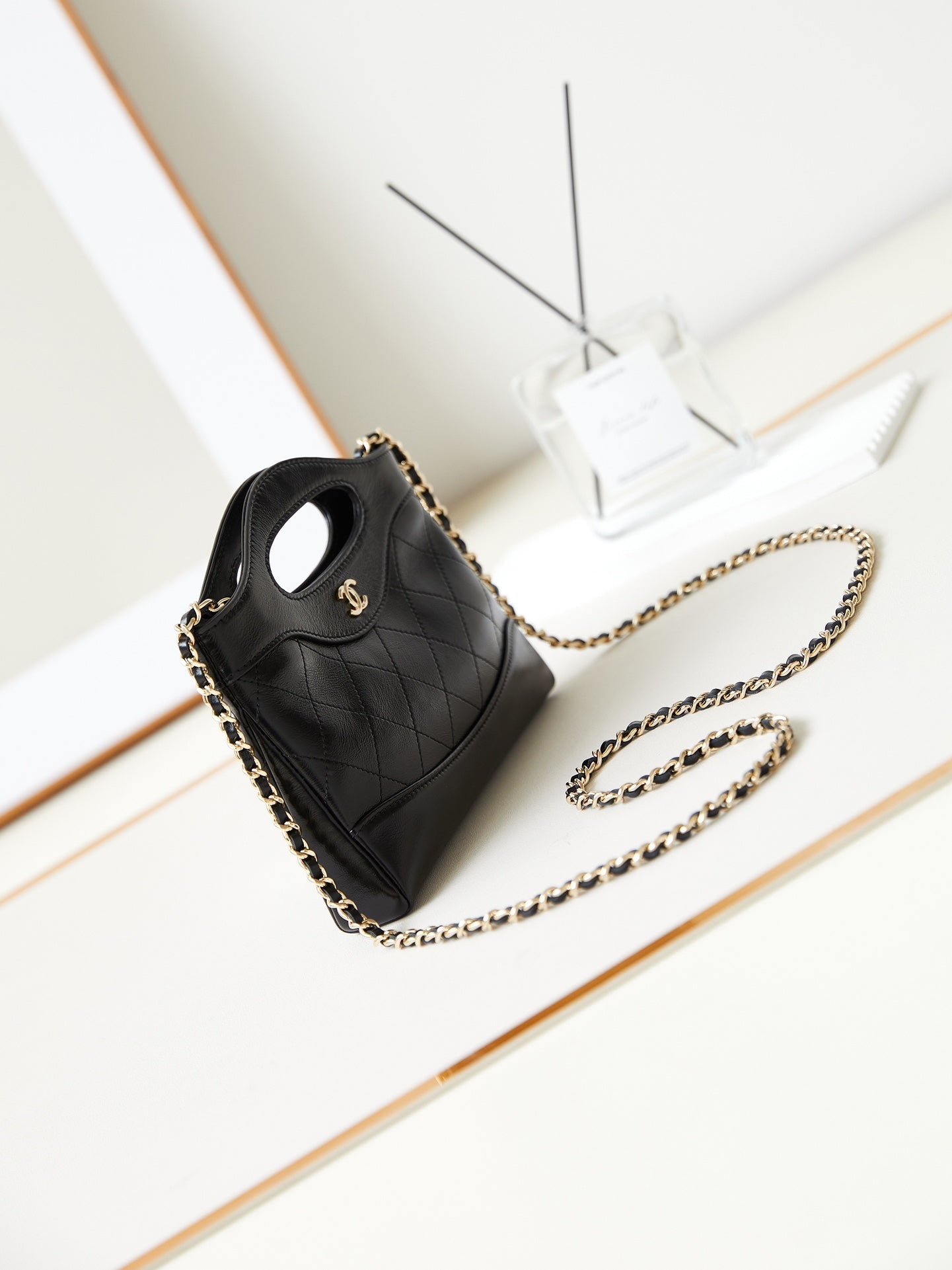CHANEL 24s31 nano shopping bag 17.5cm black lambskin gold hardware