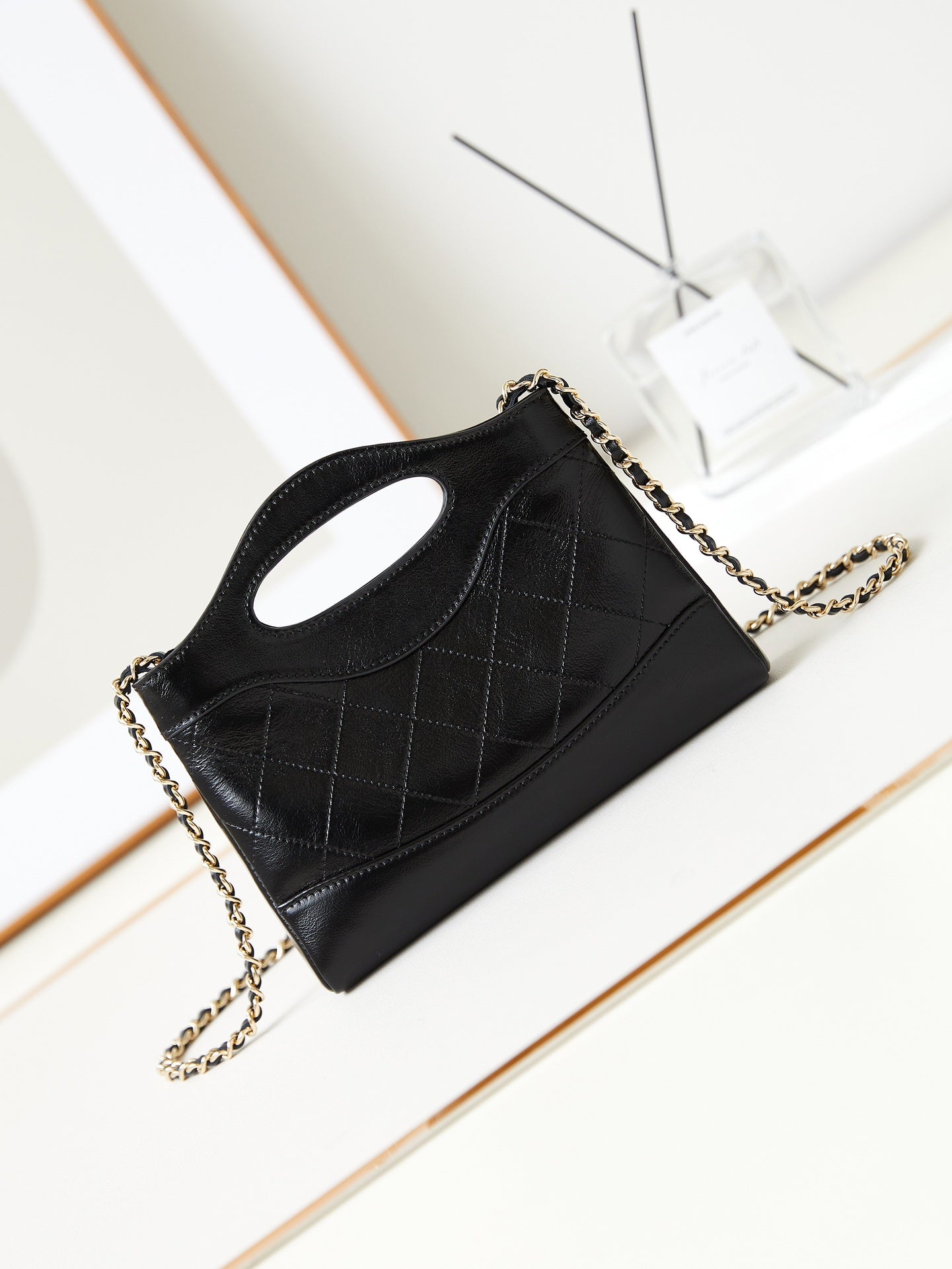 CHANEL 24s31 nano shopping bag 17.5cm black lambskin gold hardware