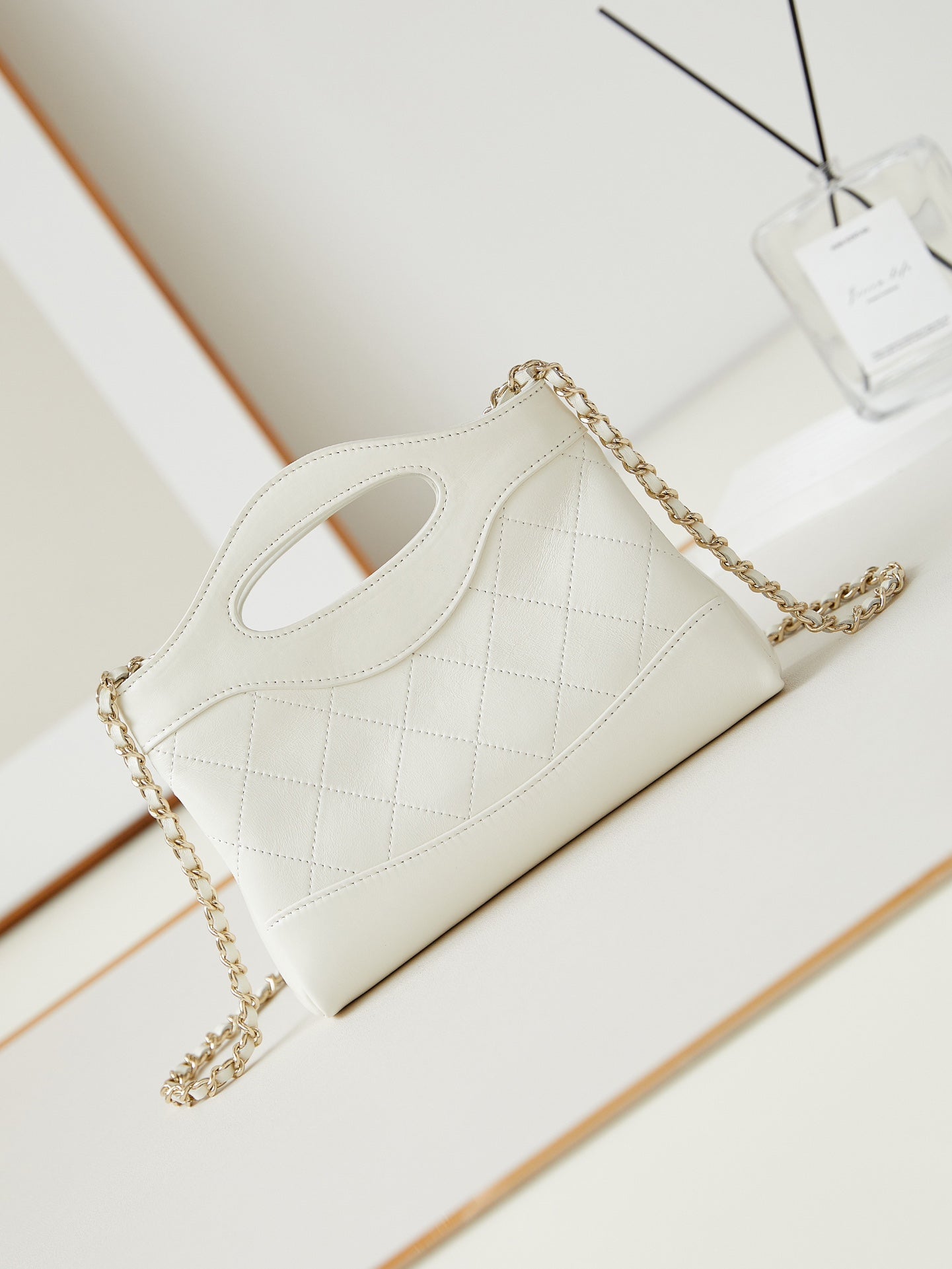 CHANEL 24s31 nano shopping bag 17.5cm white lambskin gold hardware