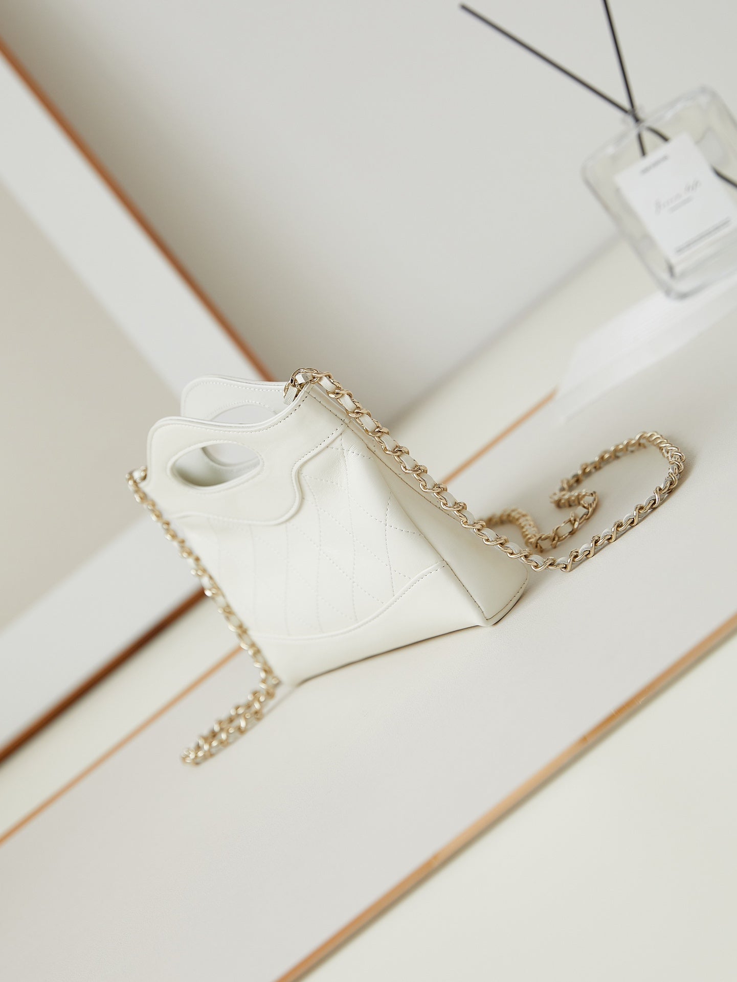 CHANEL 24s31 nano shopping bag 17.5cm white lambskin gold hardware