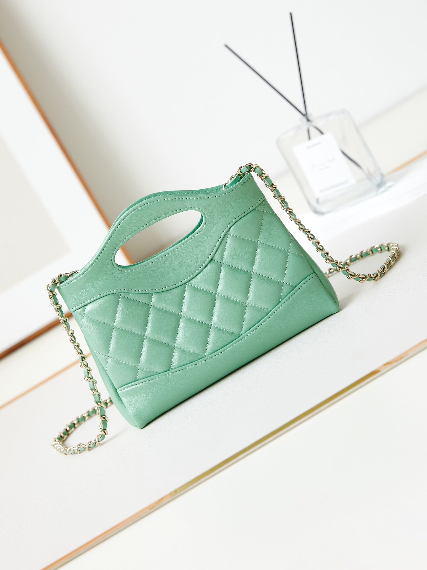 CHANEL 24s31 nano shopping bag 17.5cm light green lambskin gold hardware
