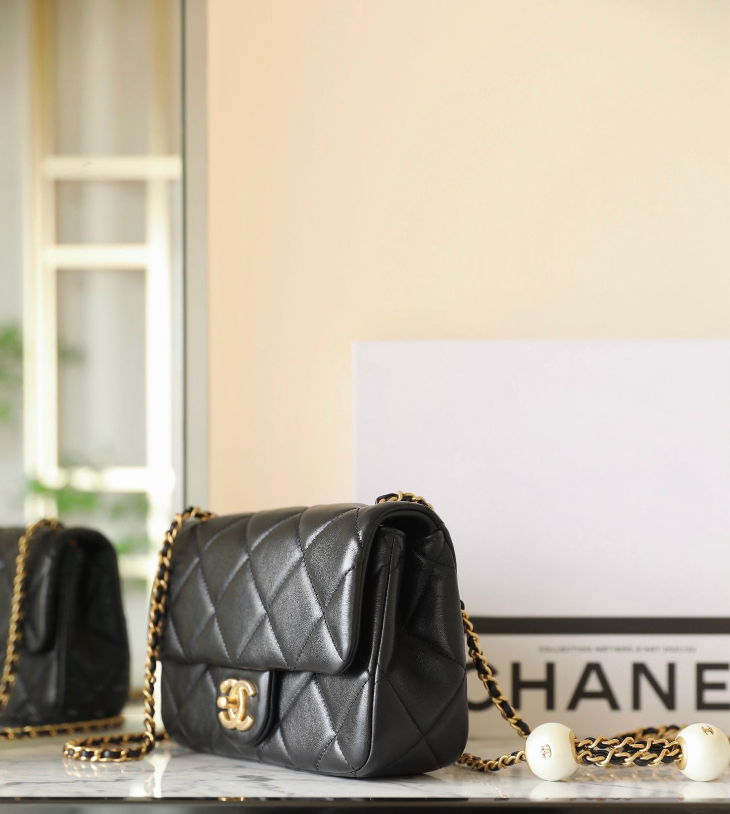 CHANEL 24s mini flap bag 20cm black lambskin pearl ball