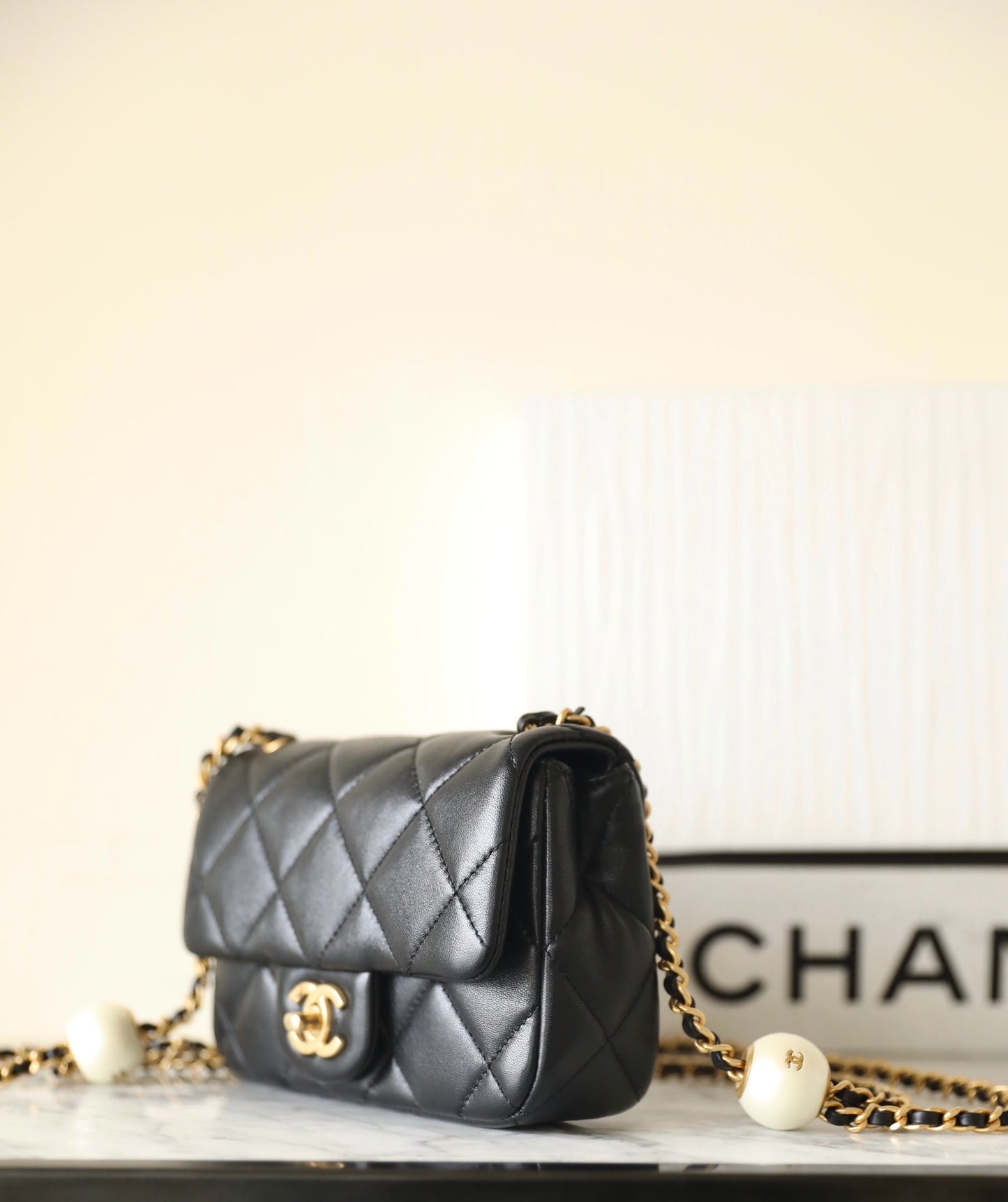 CHANEL 24s mini flap bag 17cm black lambskin pearl ball