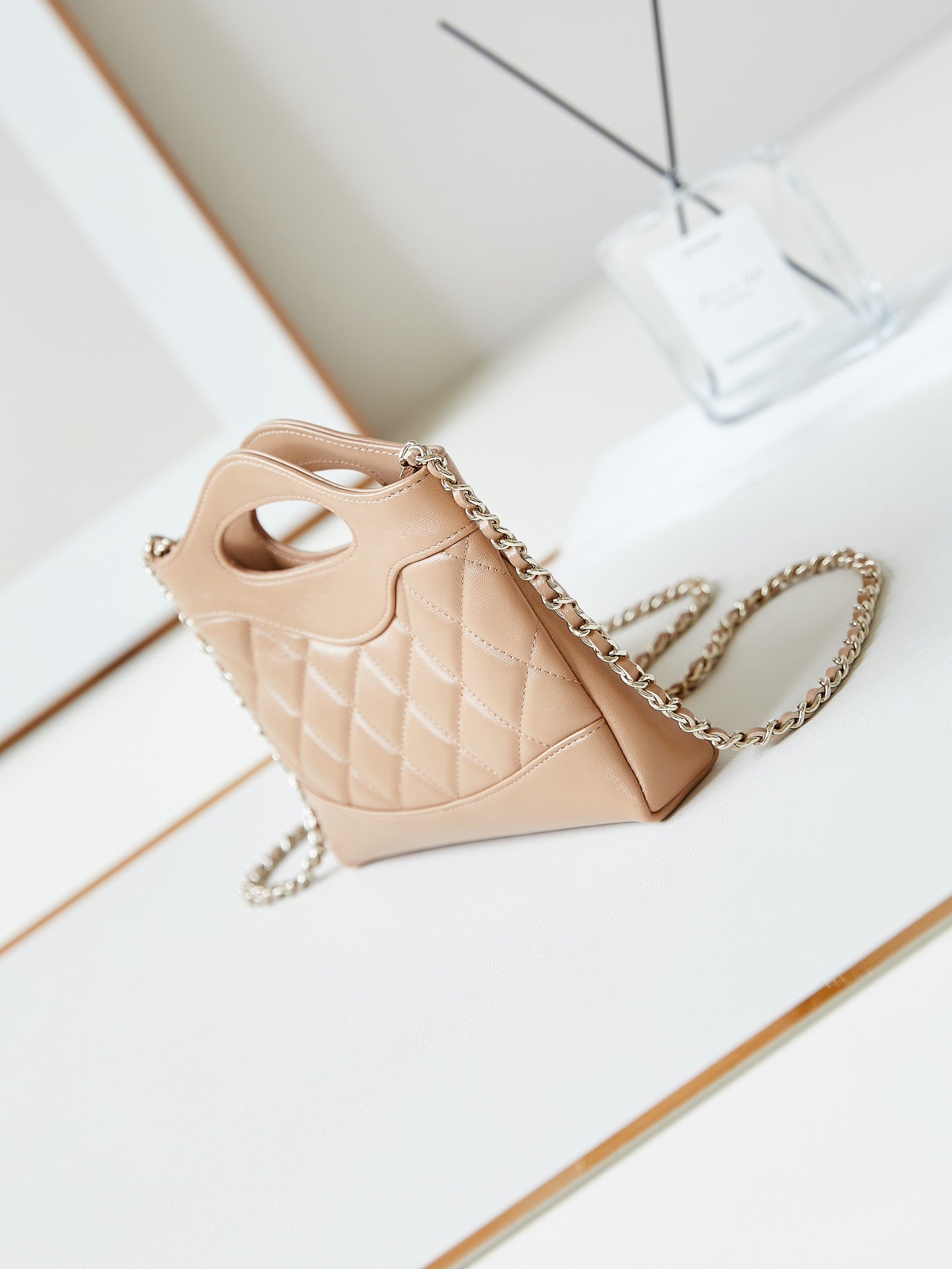 CHANEL 24s31 nano shopping bag 17.5cm brown lambskin gold hardware