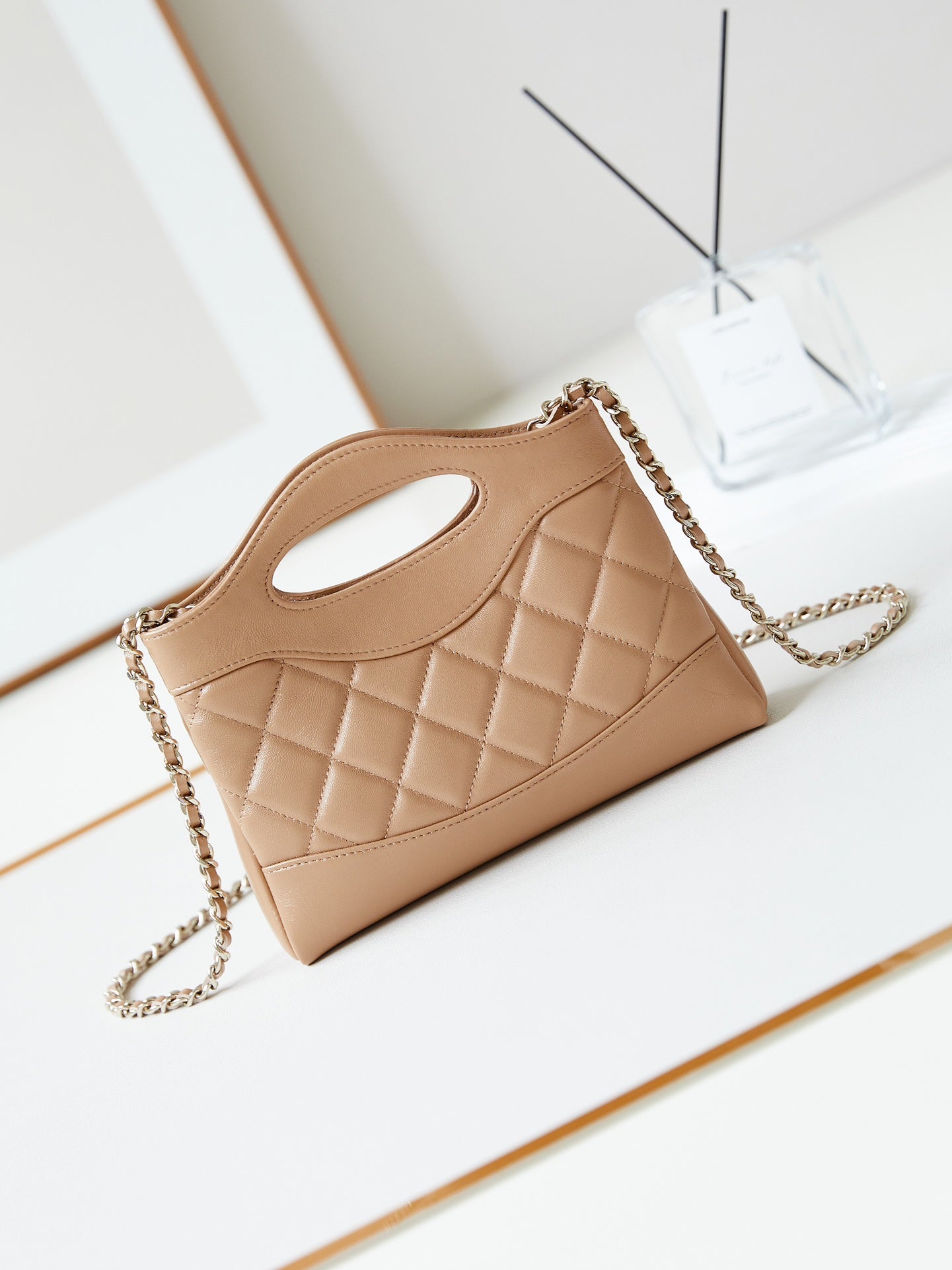 CHANEL 24s31 nano shopping bag 17.5cm brown lambskin gold hardware