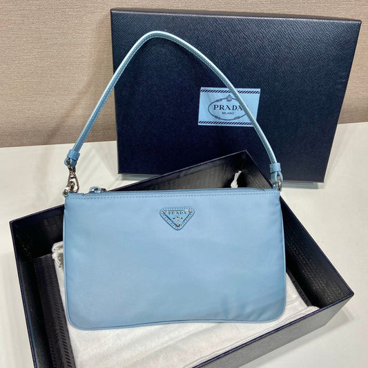 PRADA SHOULDER BAG 24 WITH TRIANGLE LOGO IN SKY BLUE RE-NYLON FABRIC