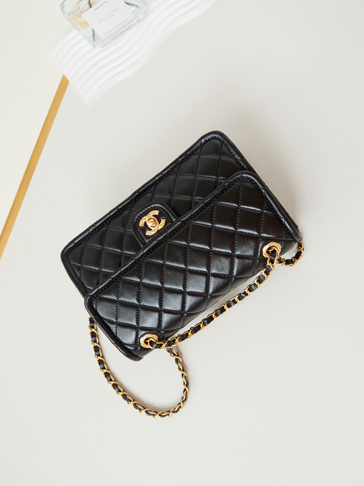 CHANEL 24s medium flap bag 25cm black calfskin gold hardware