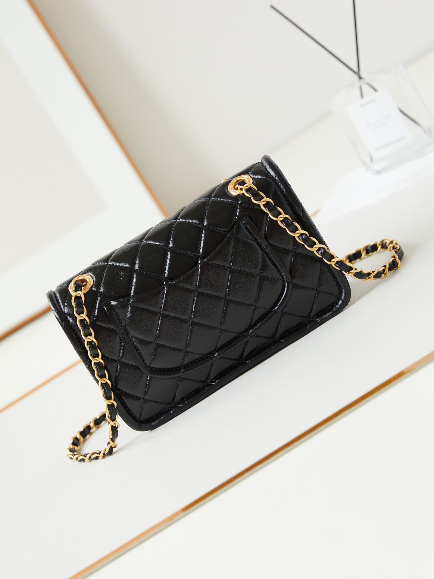 CHANEL 24s small flap bag 23cm black calfskin gold hardware