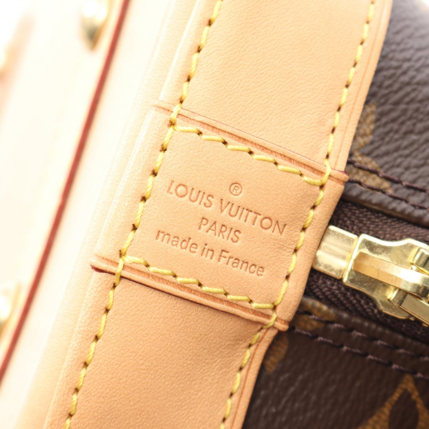 Louis Vuitton Alma BB Monogram Coated Canvas Handbag