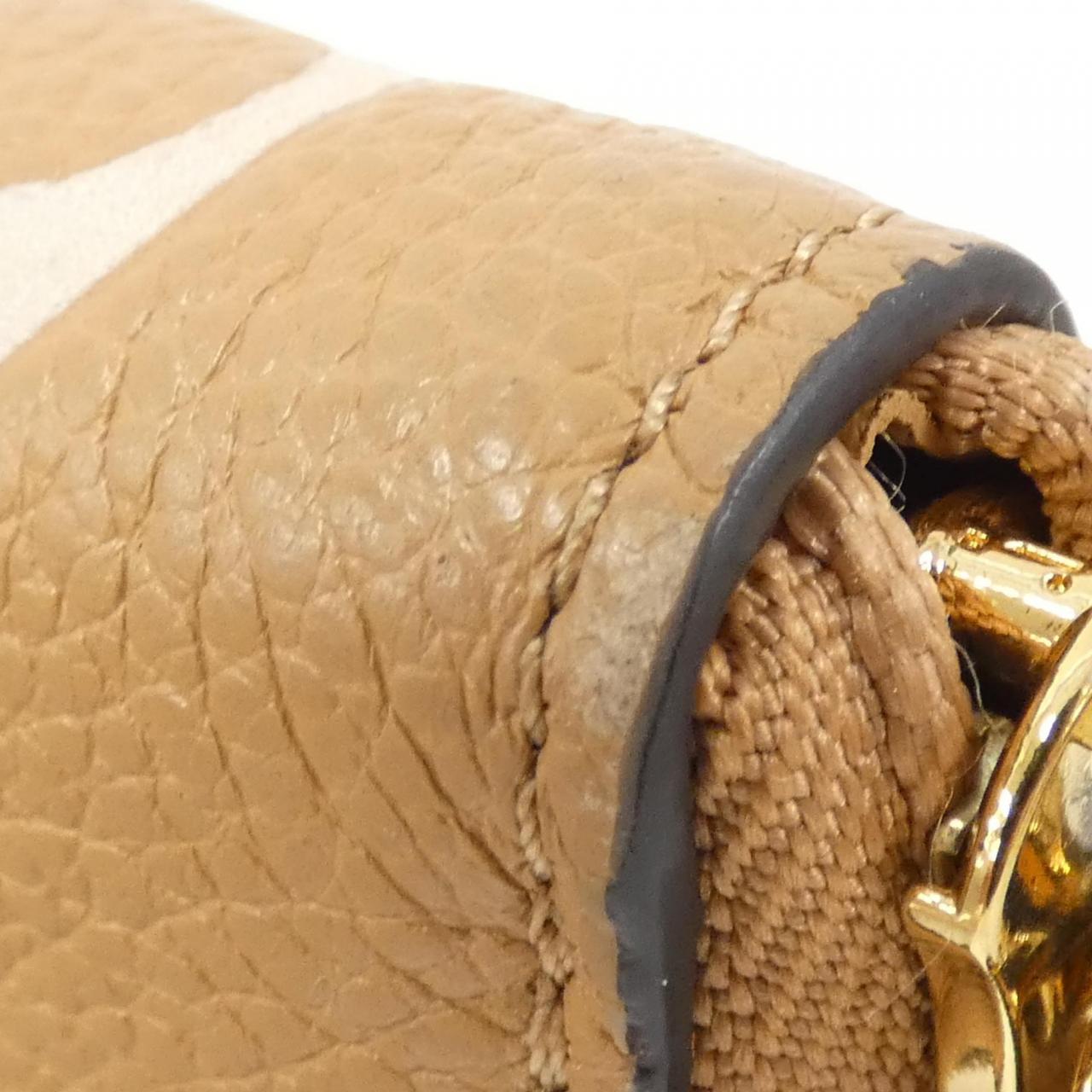 Louis Vuitton Portefeuille Clemence Monogram Empreinte Long Wallet