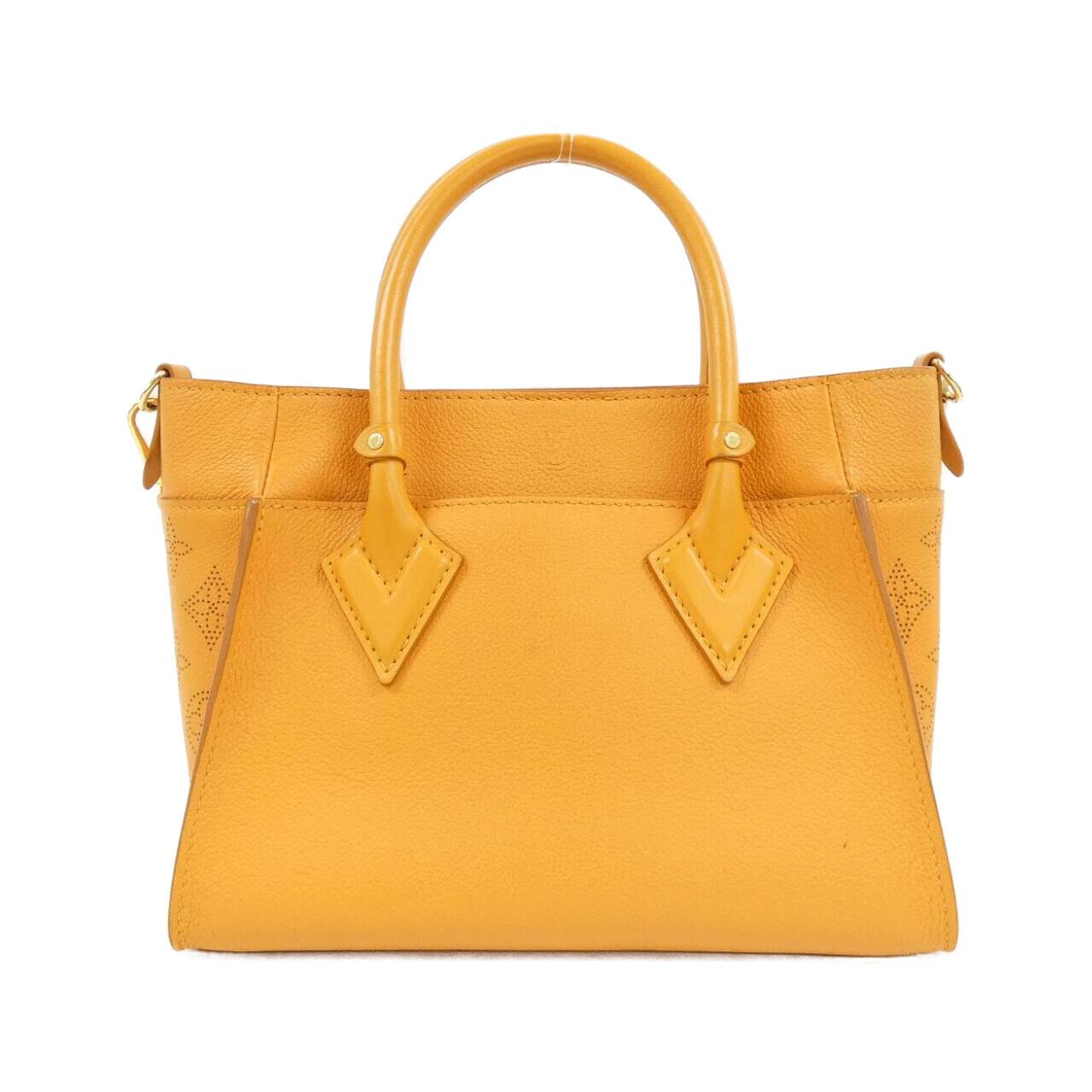 Louis Vuitton On My Side Calf Bag
