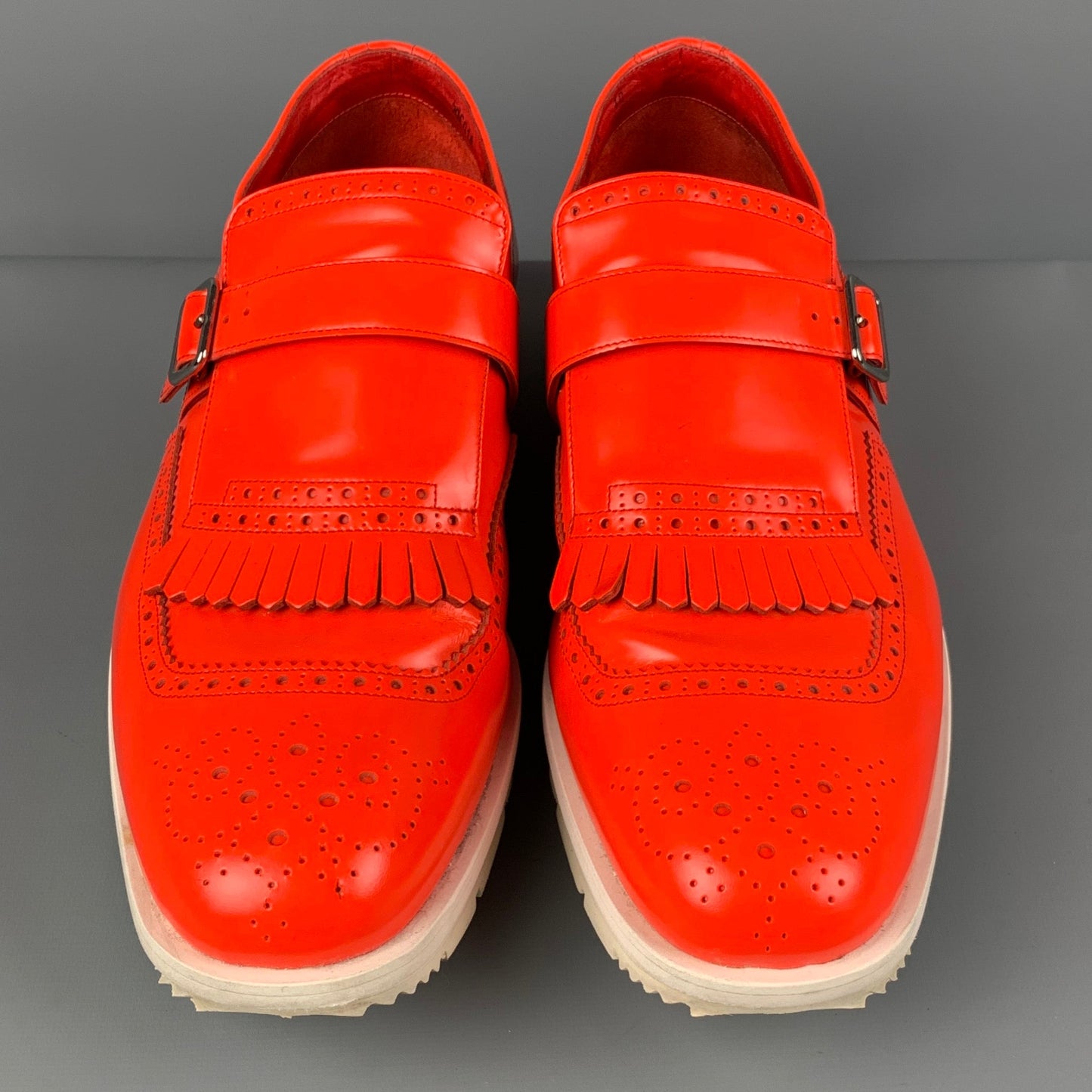 PRADA Size 11 Orange Perforated Leather Monk Strap Loafers