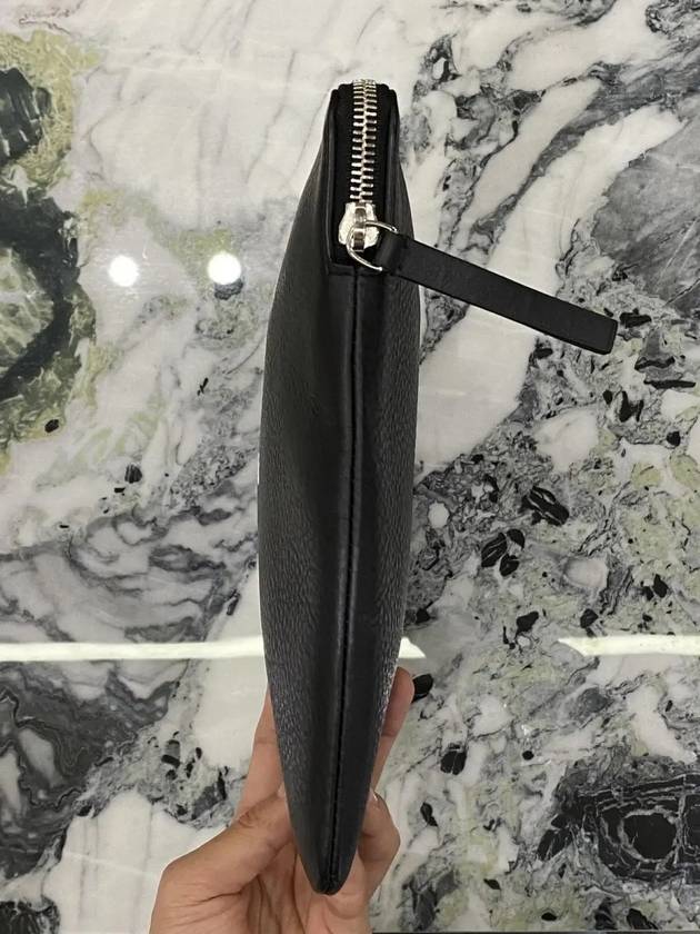 Balenciaga logo clutch bag