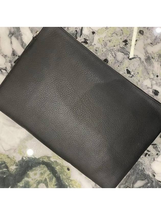 Balenciaga logo clutch bag
