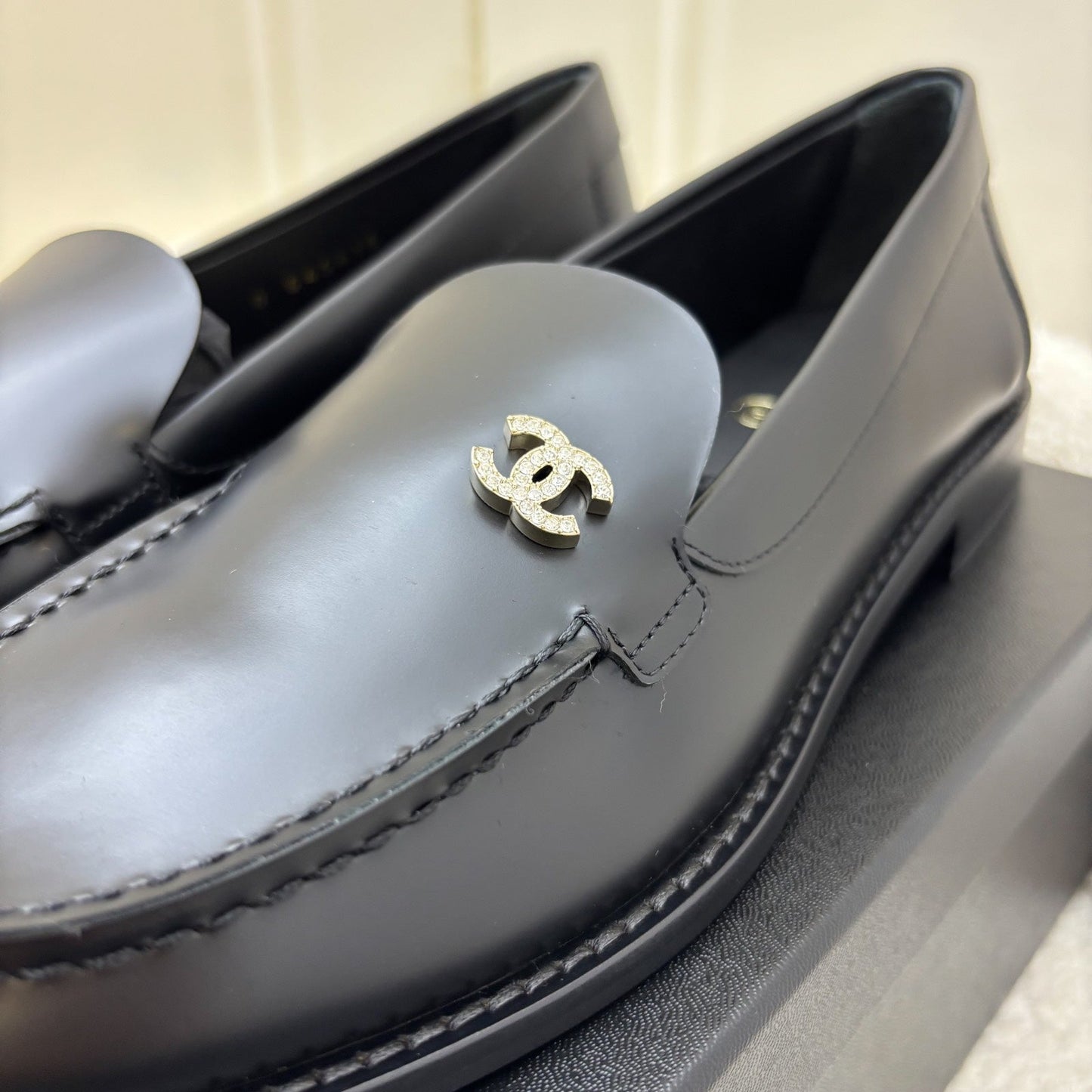 Chanel 25P Mocassins with Diamantes Studded CC Logo in Black Smooth Calfskin