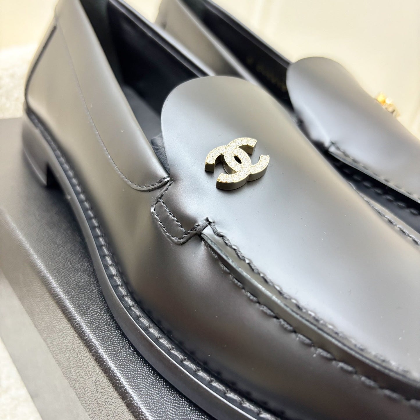 Chanel 25P Mocassins with Diamantes Studded CC Logo in Black Smooth Calfskin