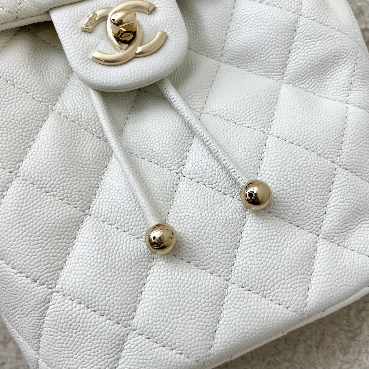 Chanel 24S Urban Spirit Backpack in White Caviar and LGHW (Model: AS4058)
