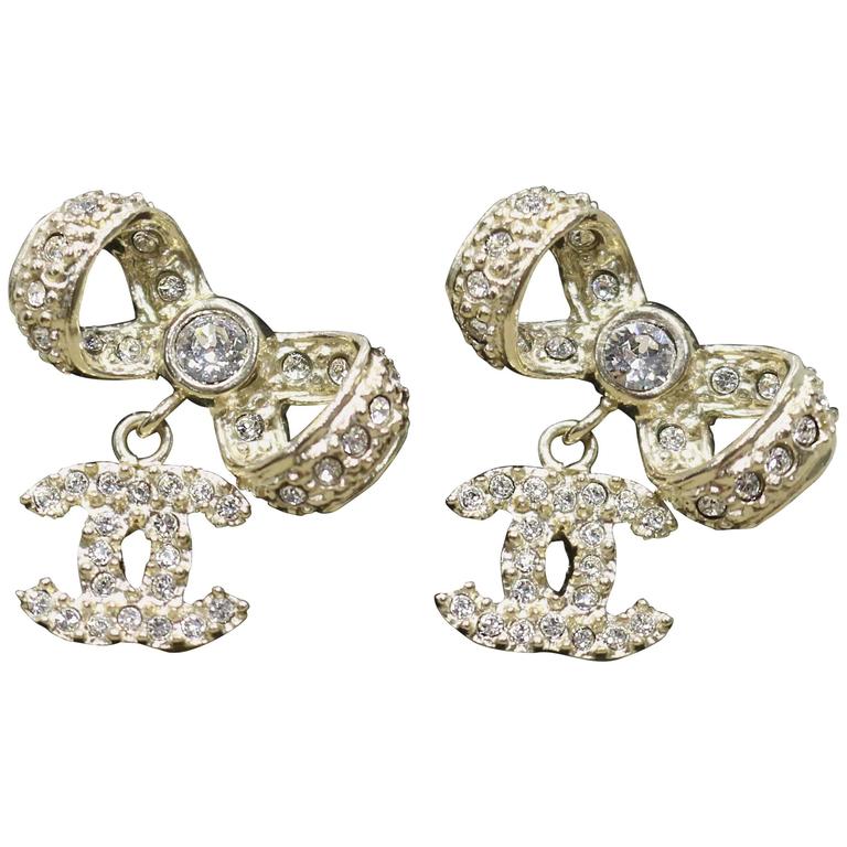 Chanel Light Gold Ribbon Bow CC Crystal Earrings