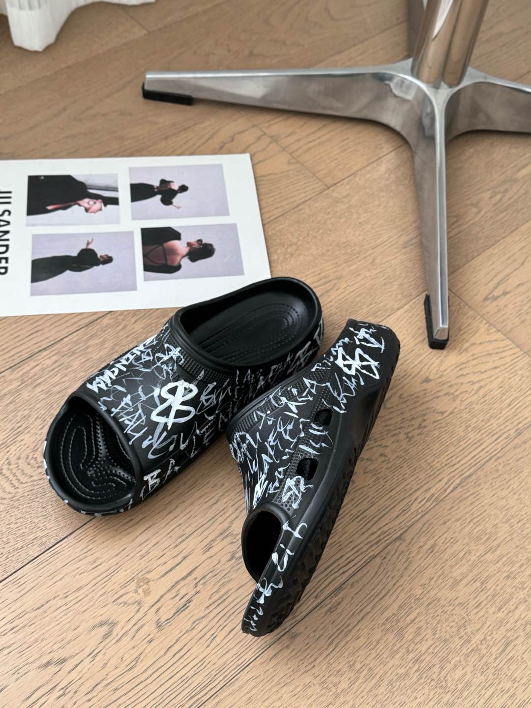 Balanciaga POOL GRAFFITI CROCS SLIDE SANDALS IN BLACK AND WHITE RUBBER