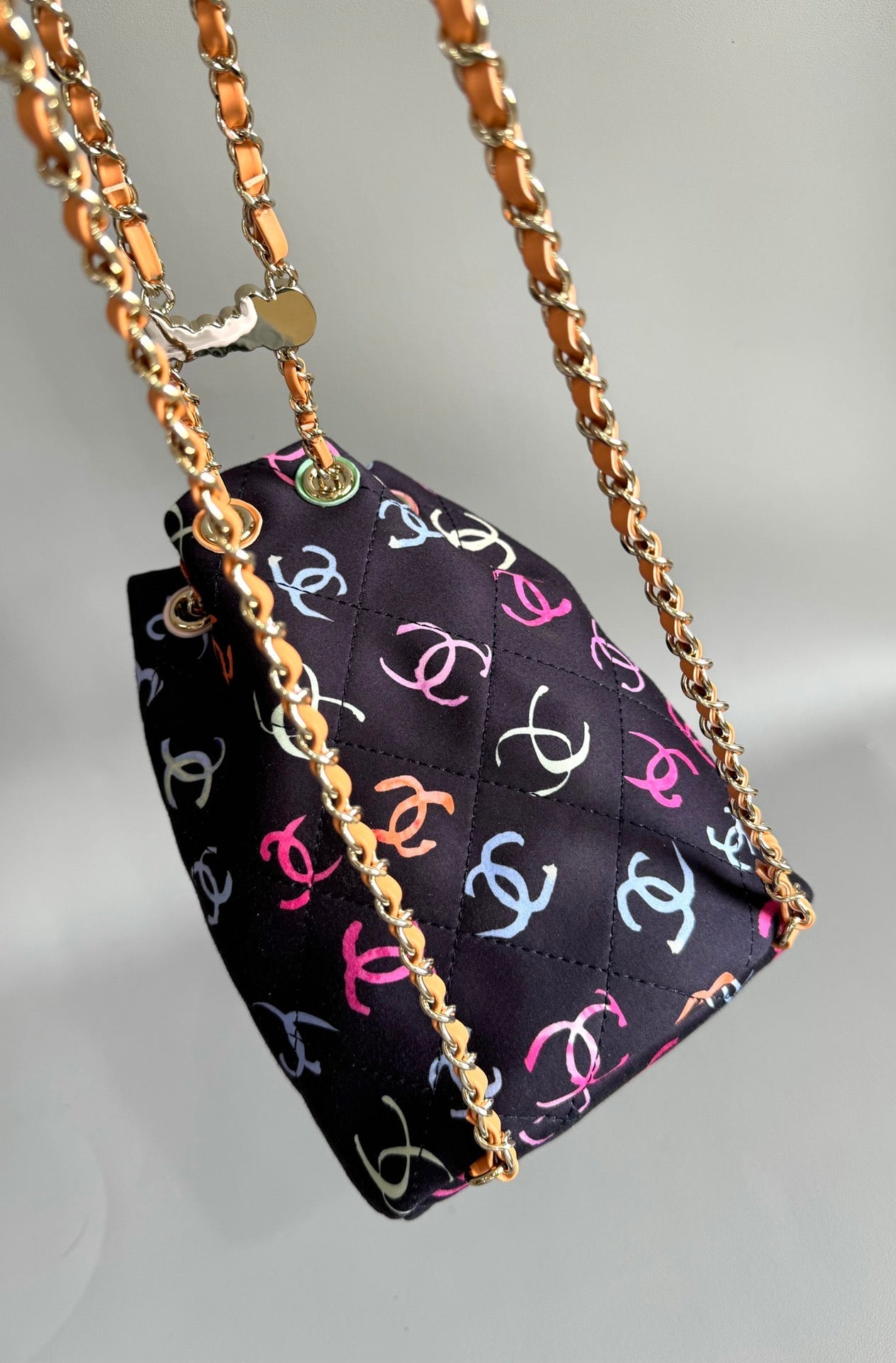 CHANEL BACKPACK 22CM BLACK & MANY OTHER COLORS PRINTED FABRIC GOLD HARDWARE
