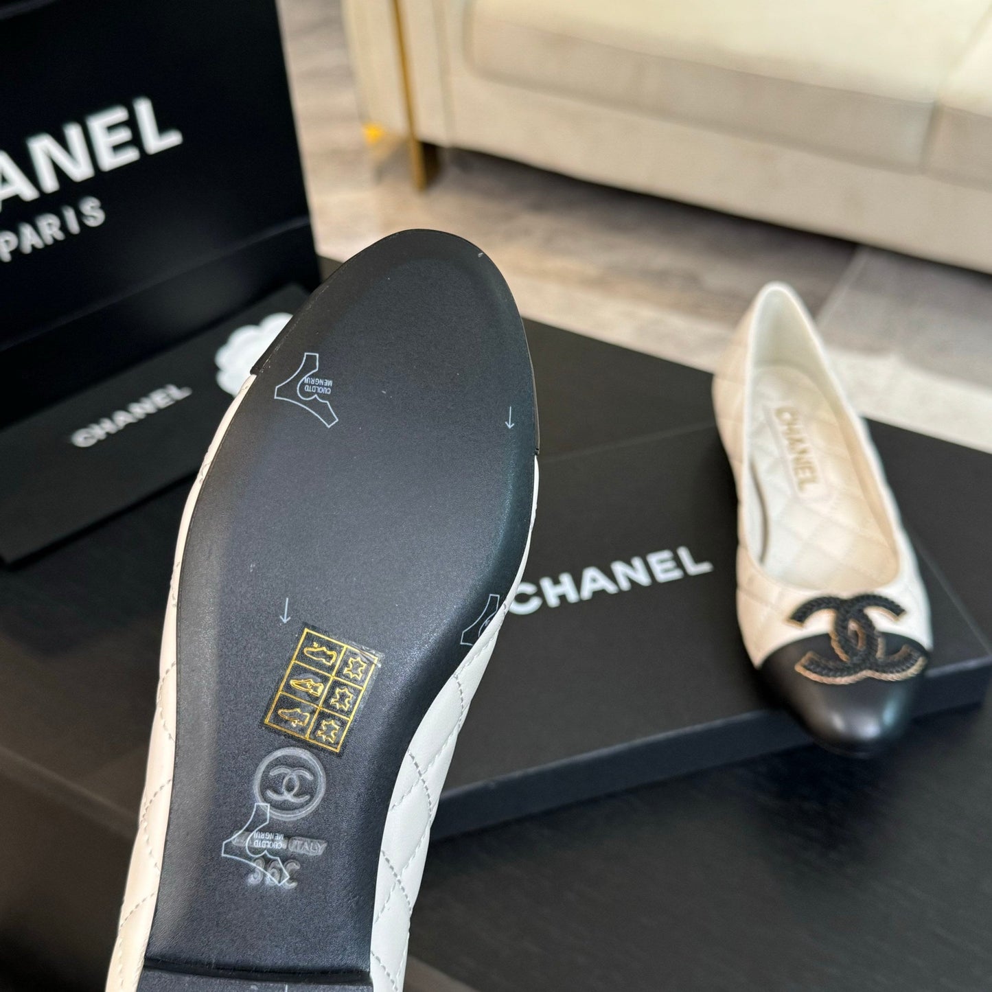 CHANEL ballet flat white quilted lambskin large black logo