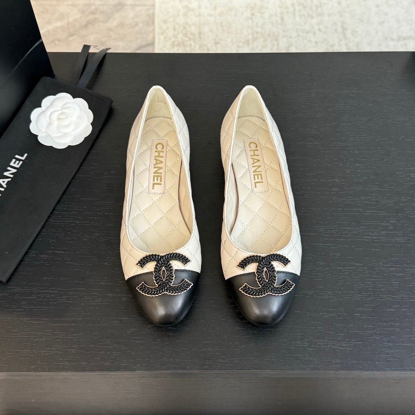 CHANEL ballet flat white quilted lambskin large black logo