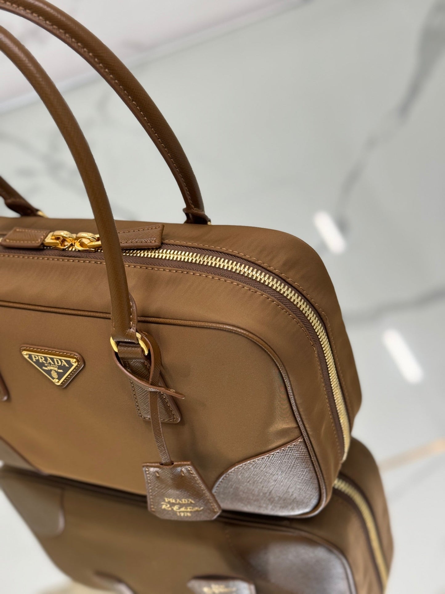 PRADA MEDIUM TOP HANDLE BAG 30 IN CHERRY WOOD NYLON AND CALFSKIN TRIM