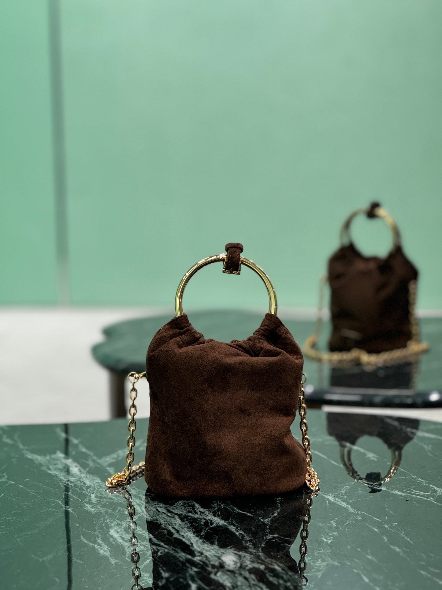 PRADA MINI BUCKET BAG 19 IN CHOCOLATE SOFT SUEDE GOLD HARDWARE