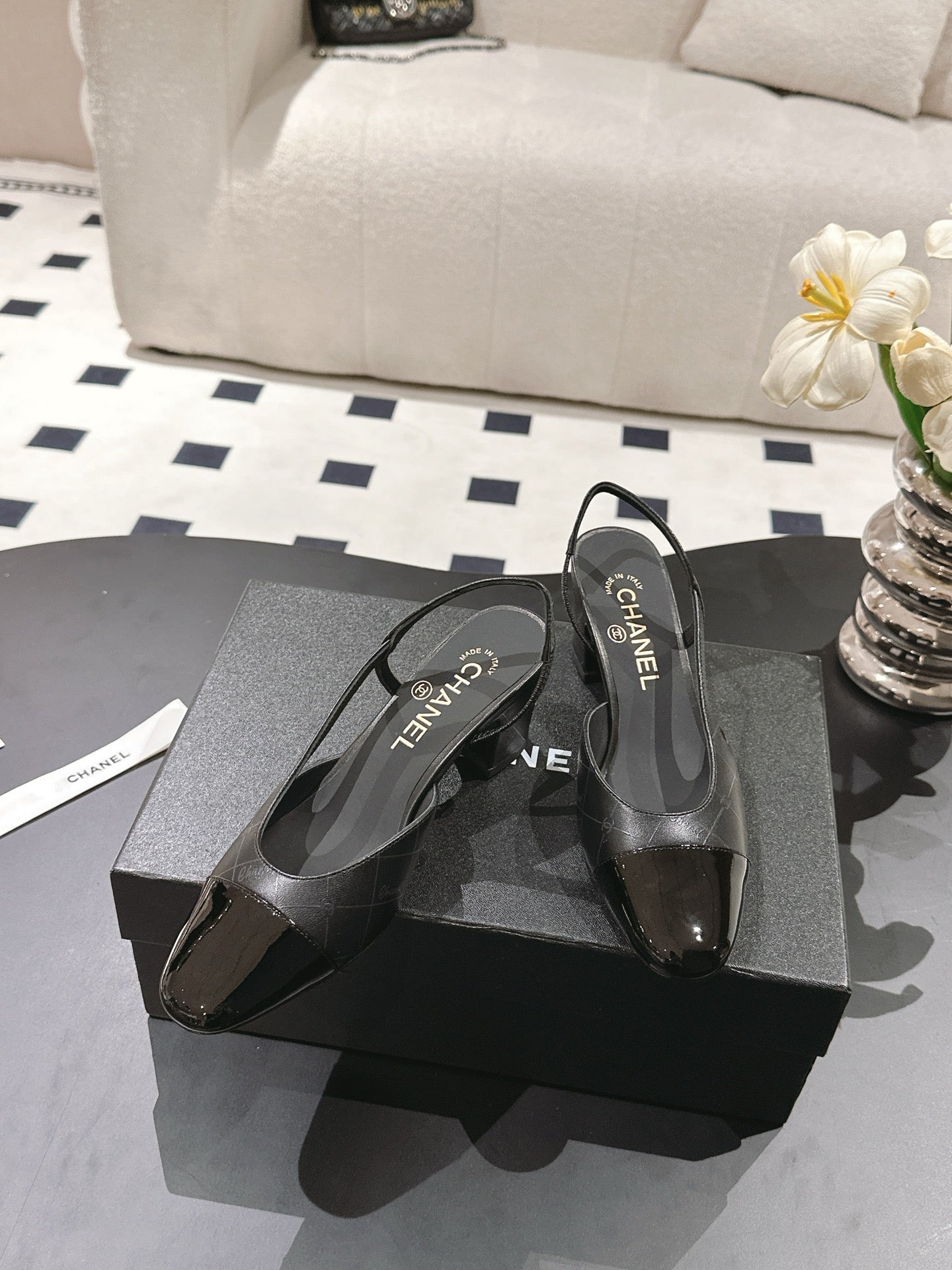 CHANEL 25 Slingback Heel Black Embossed Leather 237494
