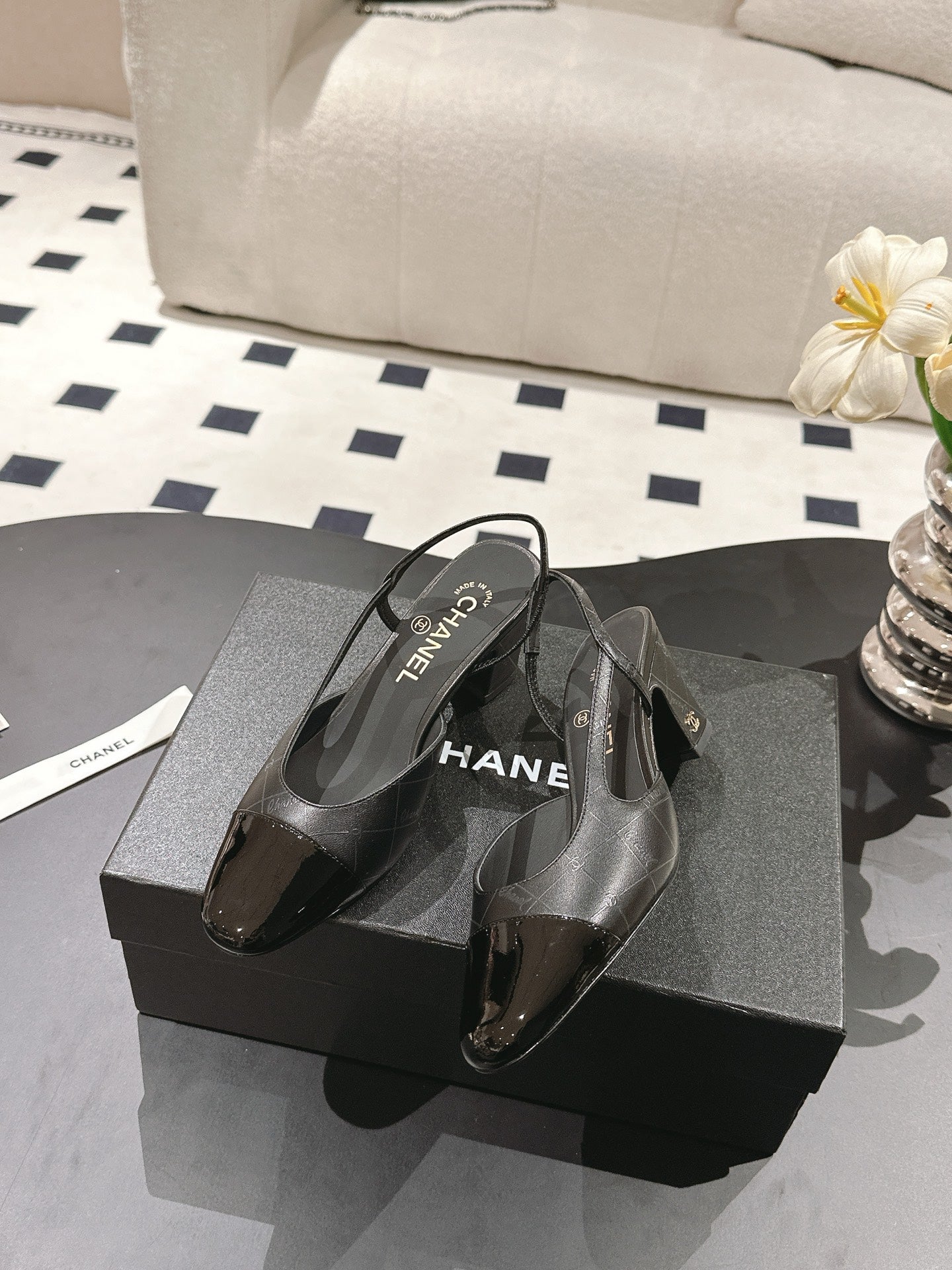CHANEL 25 Slingback Heel Black Embossed Leather 237494