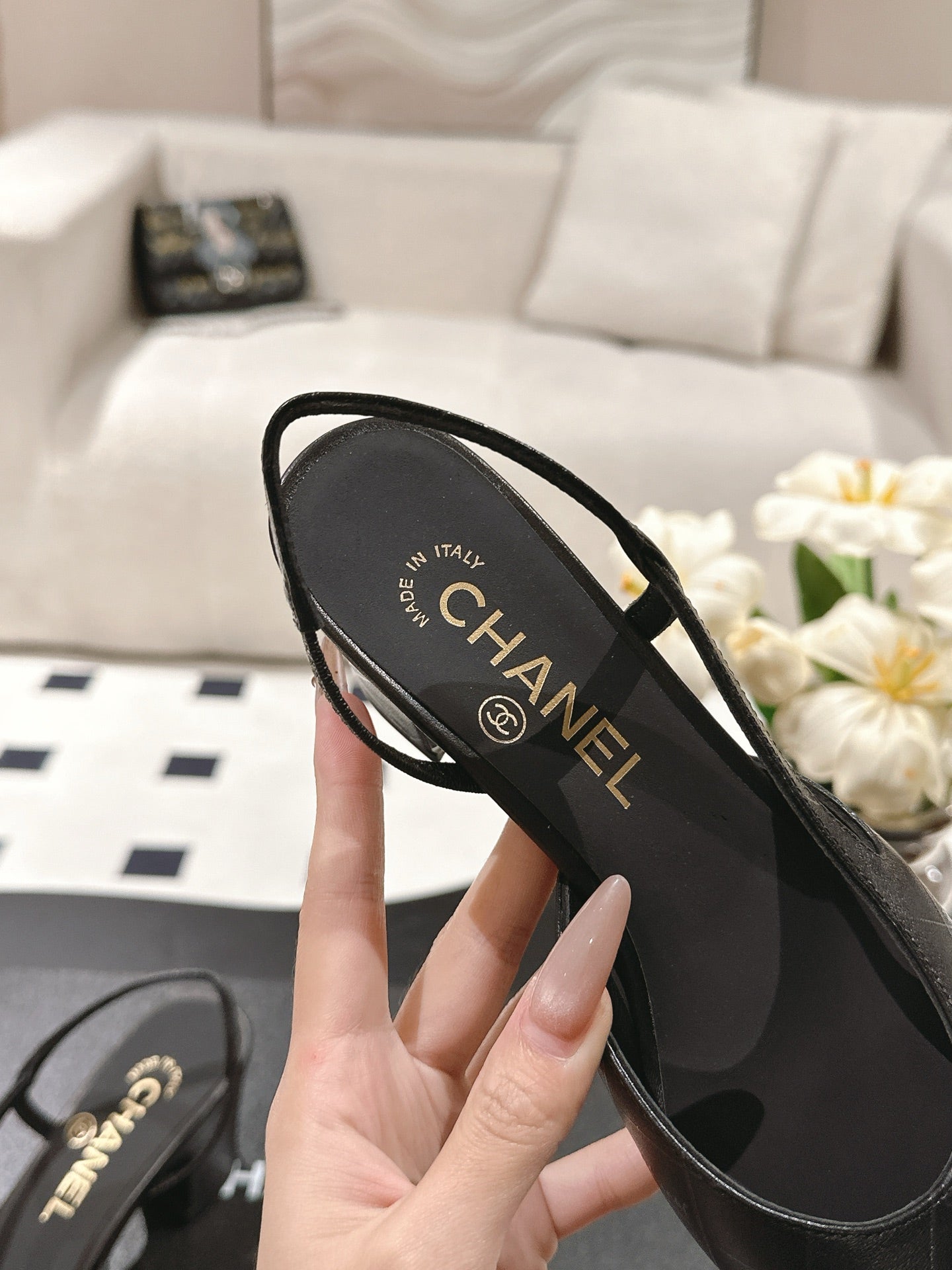 CHANEL 25 Slingback Heel Black Embossed Leather 237494