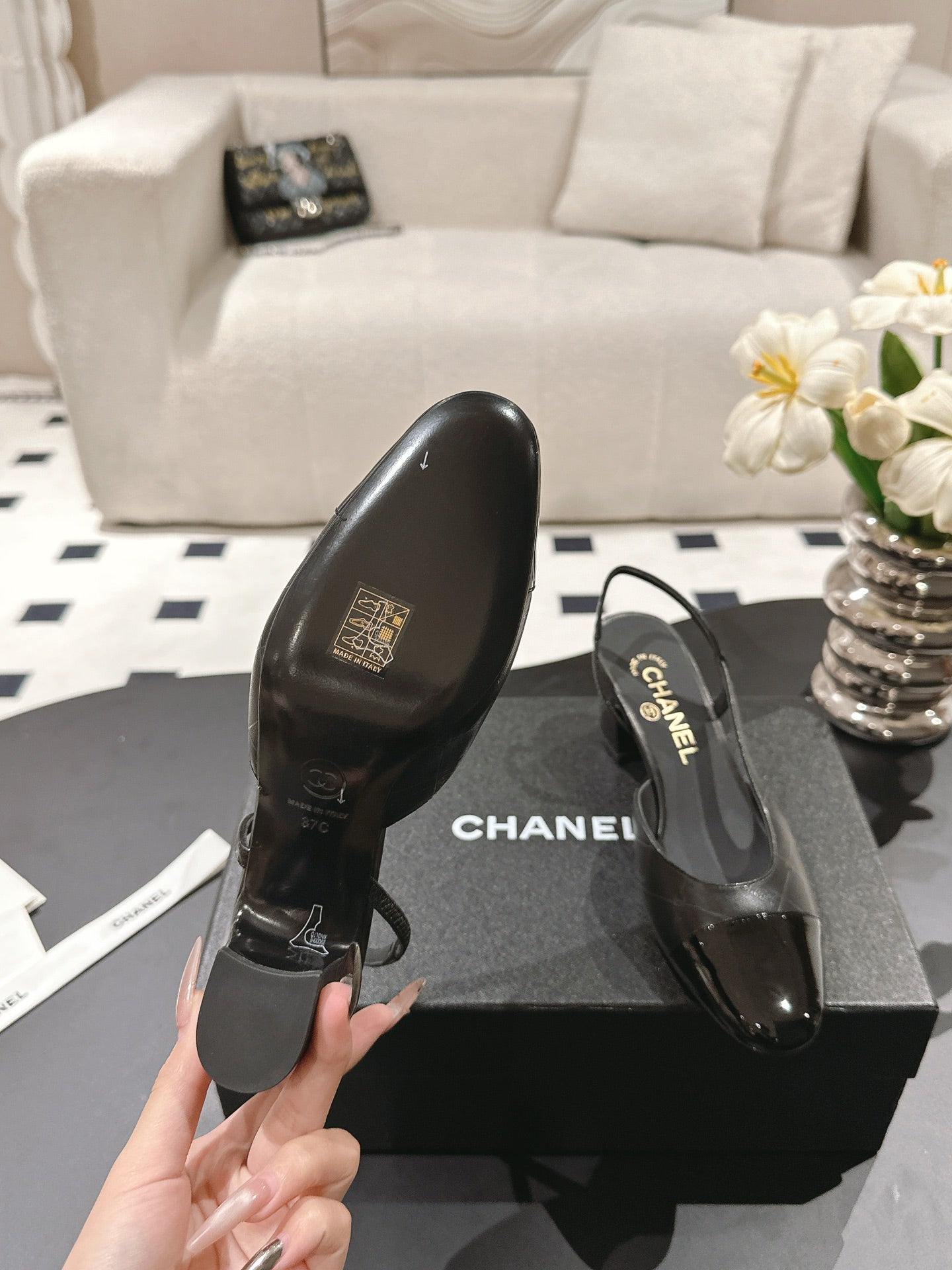 CHANEL 25 Slingback Heel Black Embossed Leather 237494