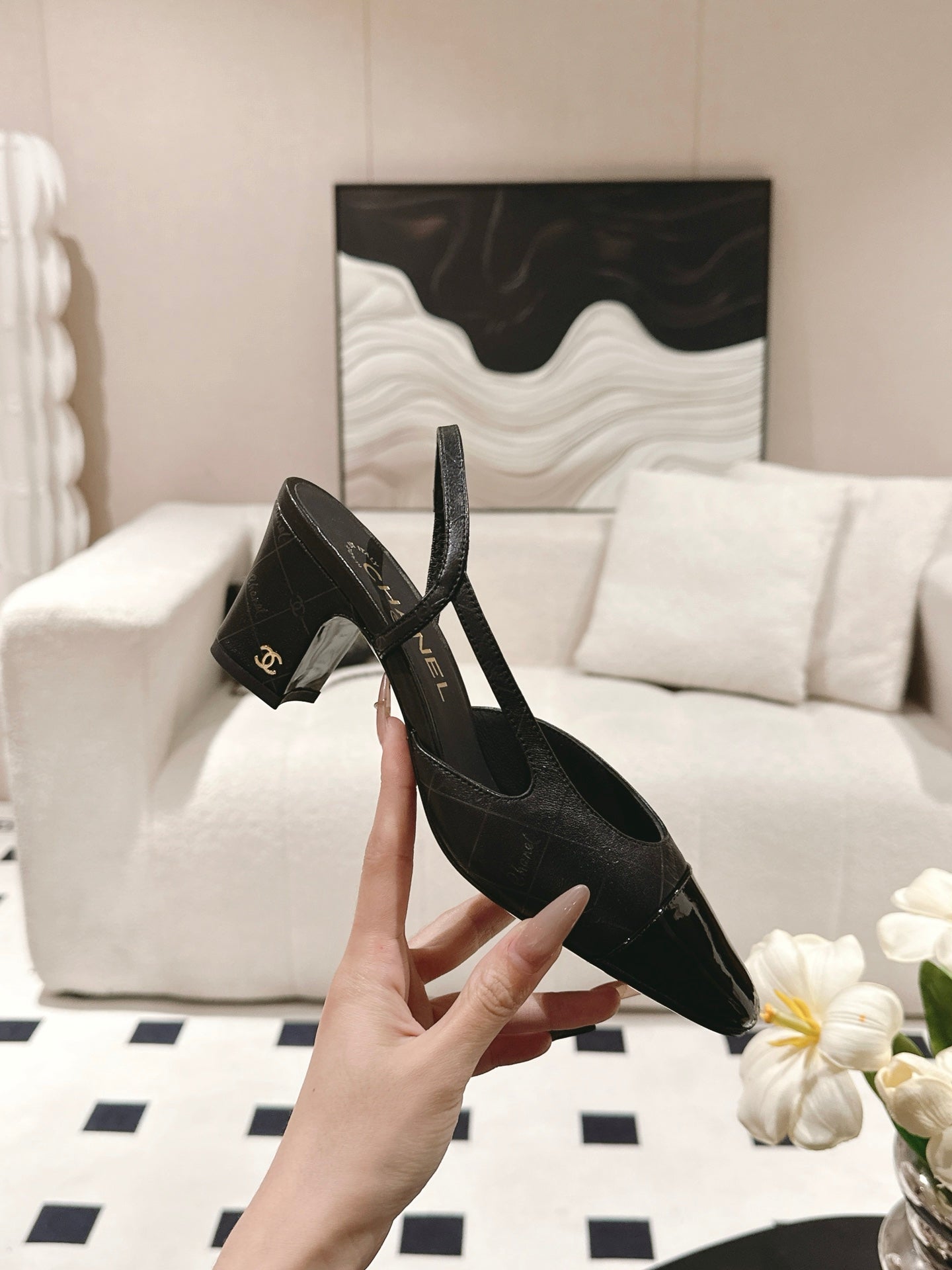 CHANEL 25 Slingback Heel Black Embossed Leather 237494