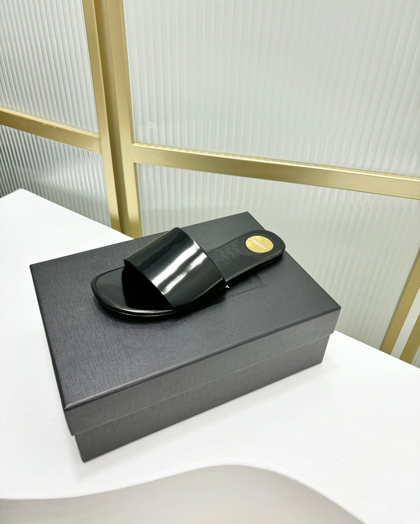 Saint Laurent CARLYLE SLIDES IN BLACK GLAZED LEATHER