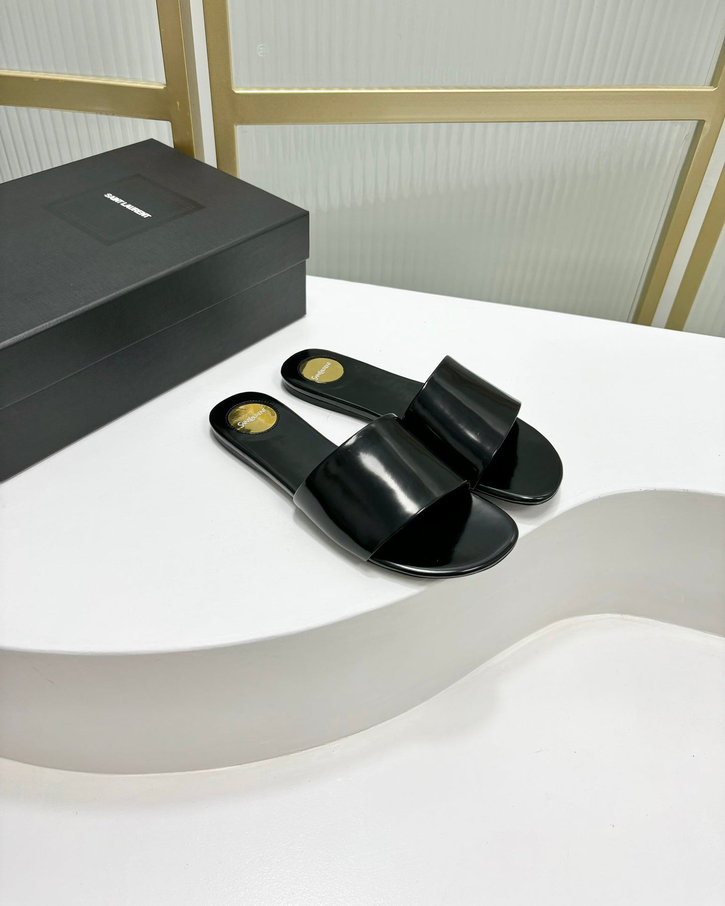 Saint Laurent CARLYLE SLIDES IN BLACK GLAZED LEATHER