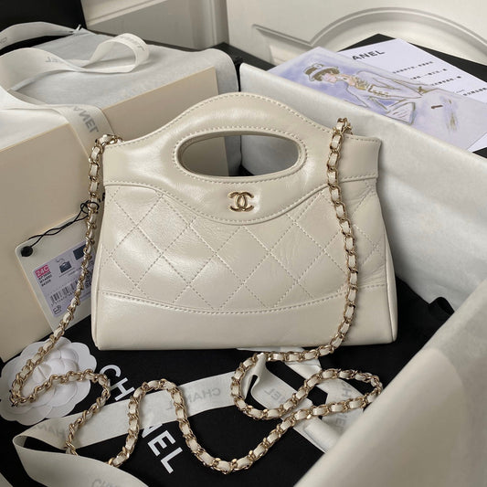 CHANEL 24s31 nano shopping bag 17.5cm cream lambskin gold hardware