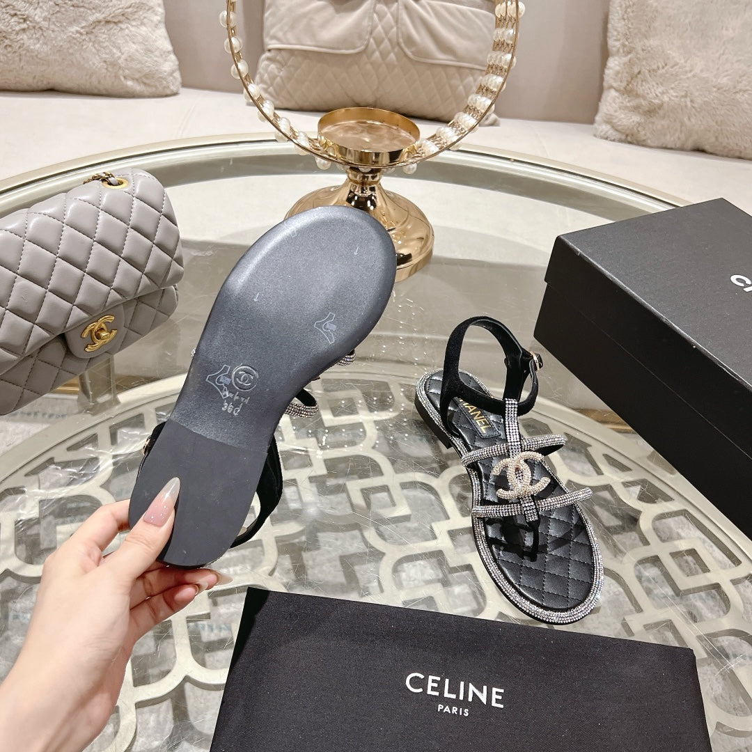 CHANEL 25C Thong Sandal Black with White Sheepskin 213340