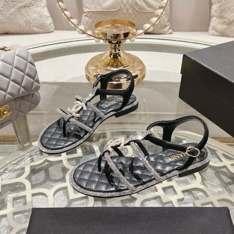 CHANEL 25C Thong Sandal Black with White Sheepskin 213340