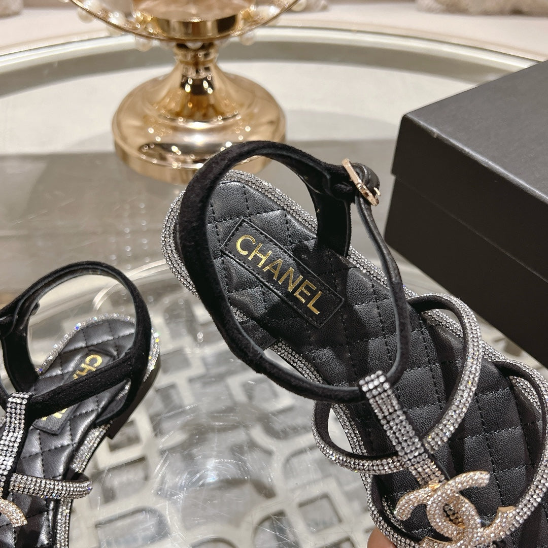 CHANEL 25C Thong Sandal Black with White Sheepskin 213340
