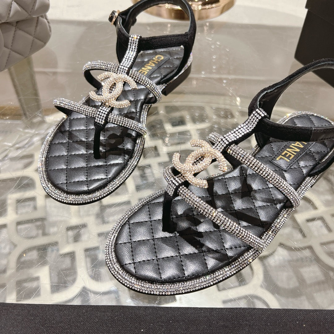 CHANEL 25C Thong Sandal Black with White Sheepskin 213340