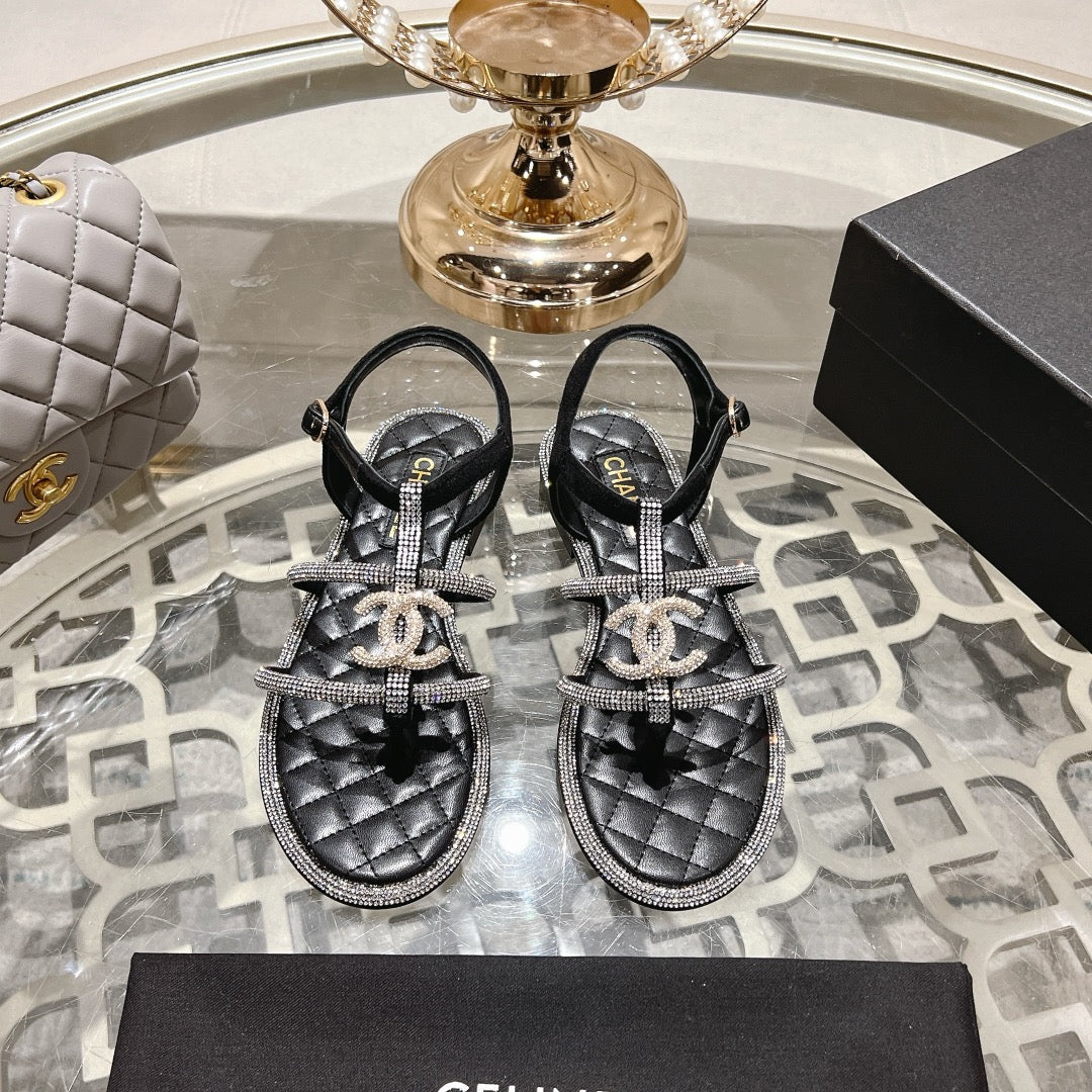 CHANEL 25C Thong Sandal Black with White Sheepskin 213340