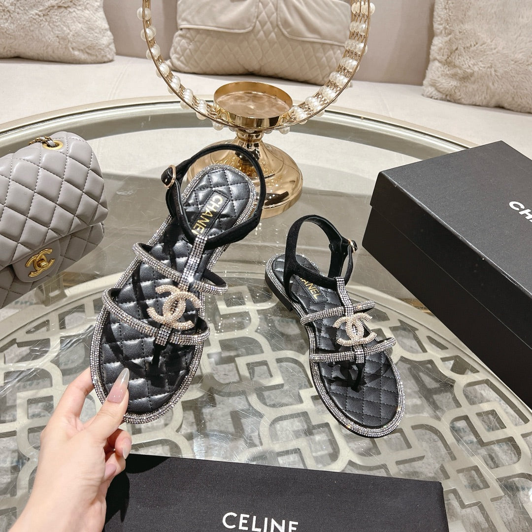 CHANEL 25C Thong Sandal Black with White Sheepskin 213340