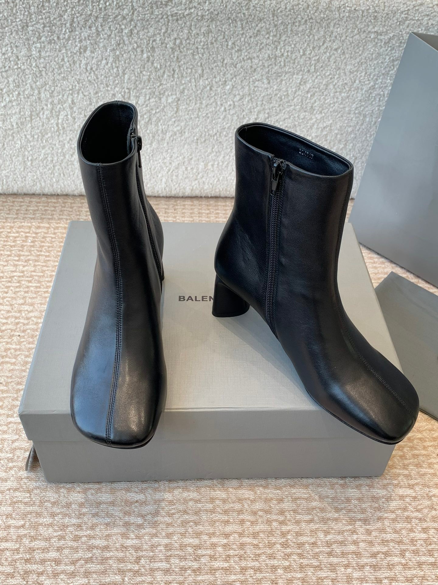 Balanciaga ANKLE BOOTS IN BLACK LOGO EMBOSSED SOFT SHEEPSKIN
