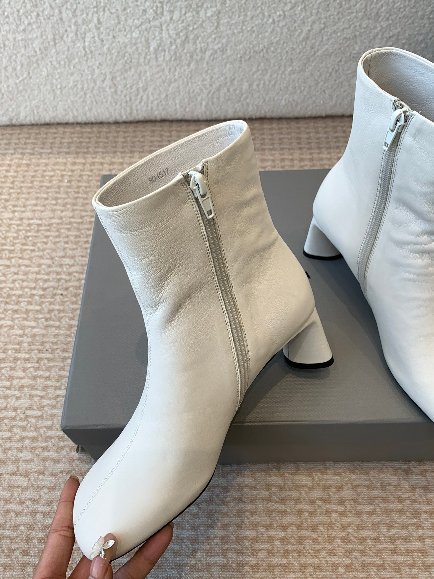 Balanciaga ANKLE BOOTS IN WHITE LOGO EMBOSSED SOFT SHEEPSKIN