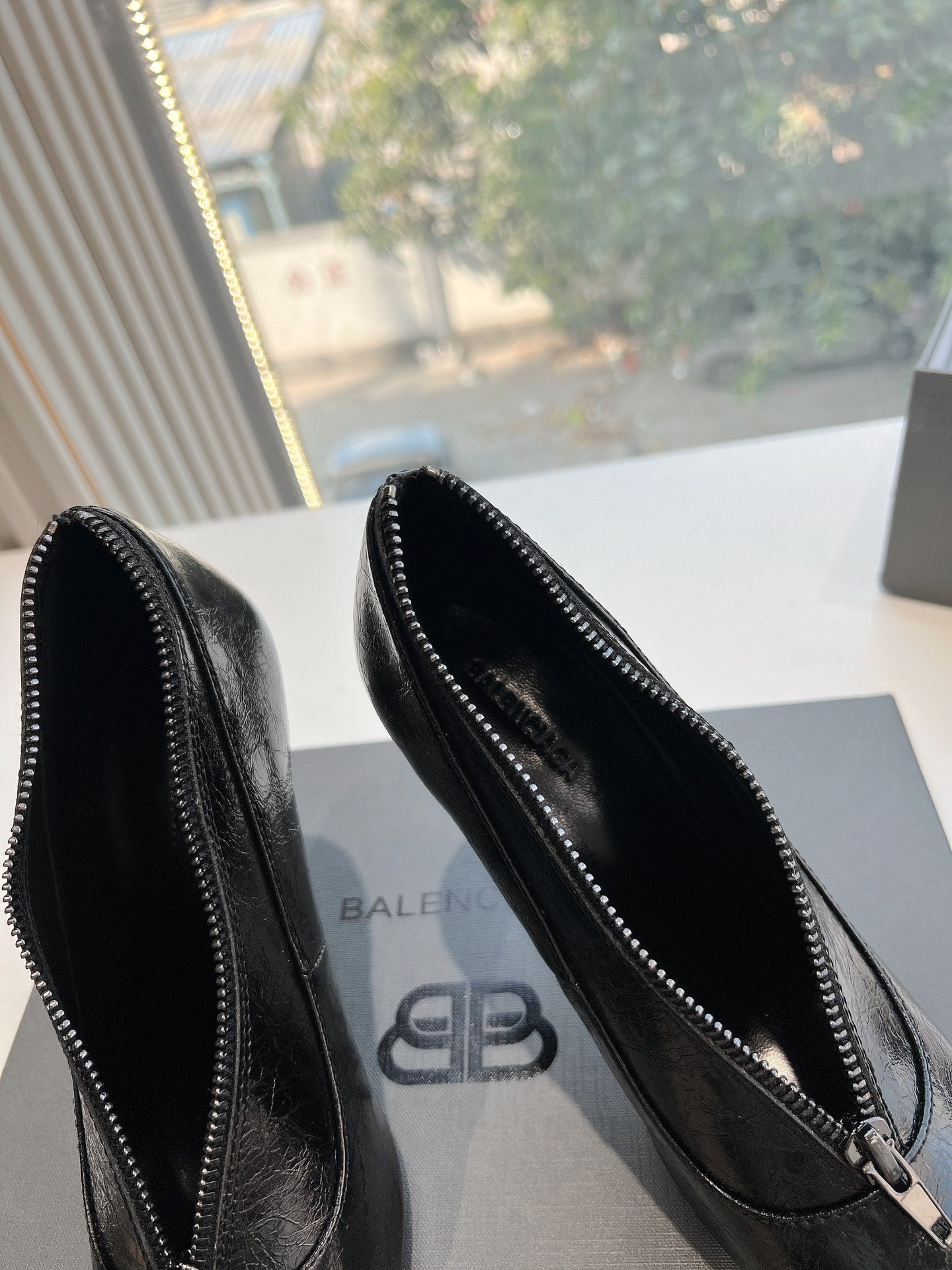 Balanciaga ZIPPER POINTED-TOE HIGH PUMPS IN BLACK WAX-OIL SHEEPSKIN