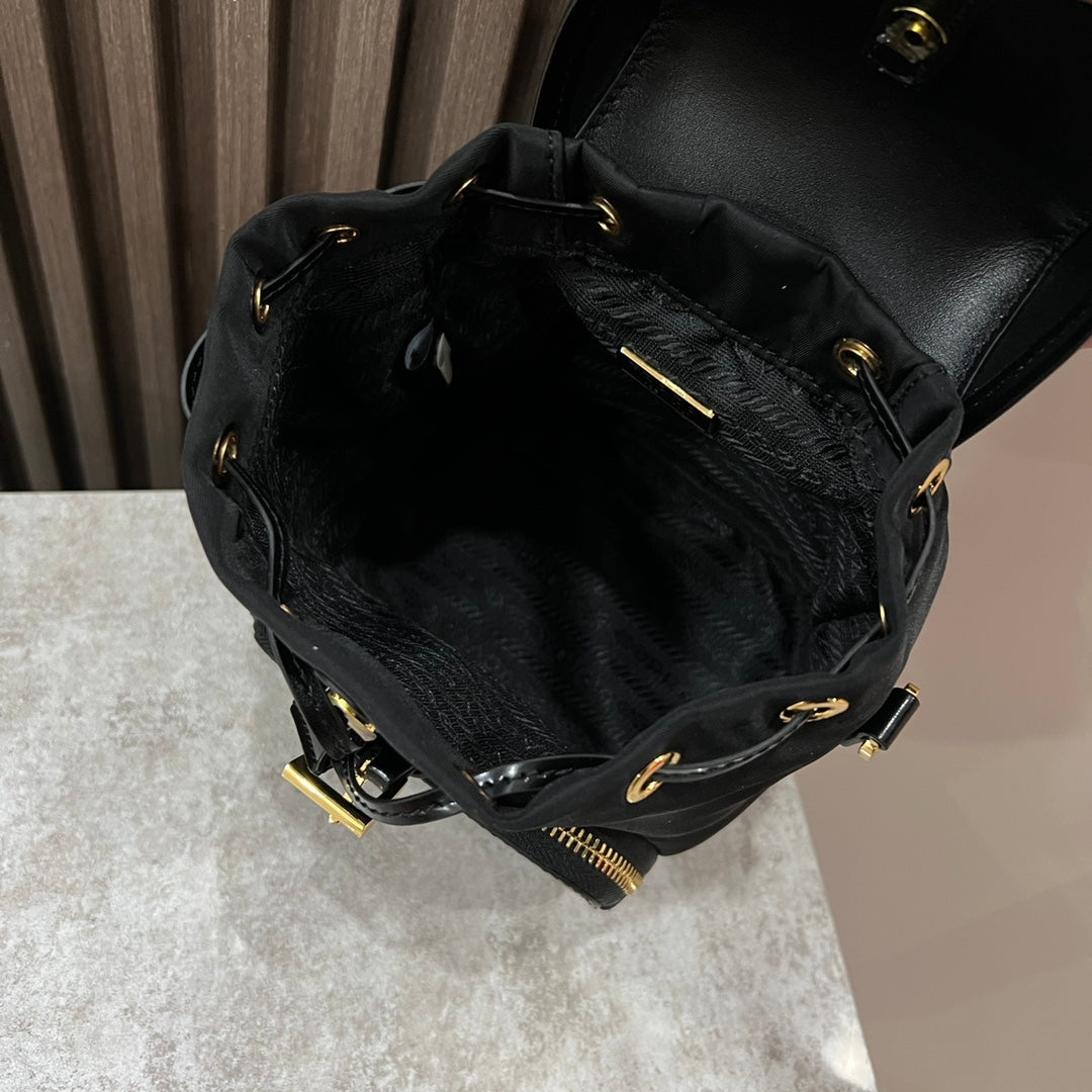 PRADA MINI BACKPACK 18 IN BLACK RE-NYLON AND GLOSSY CALFSKIN GOLD HARDWARE