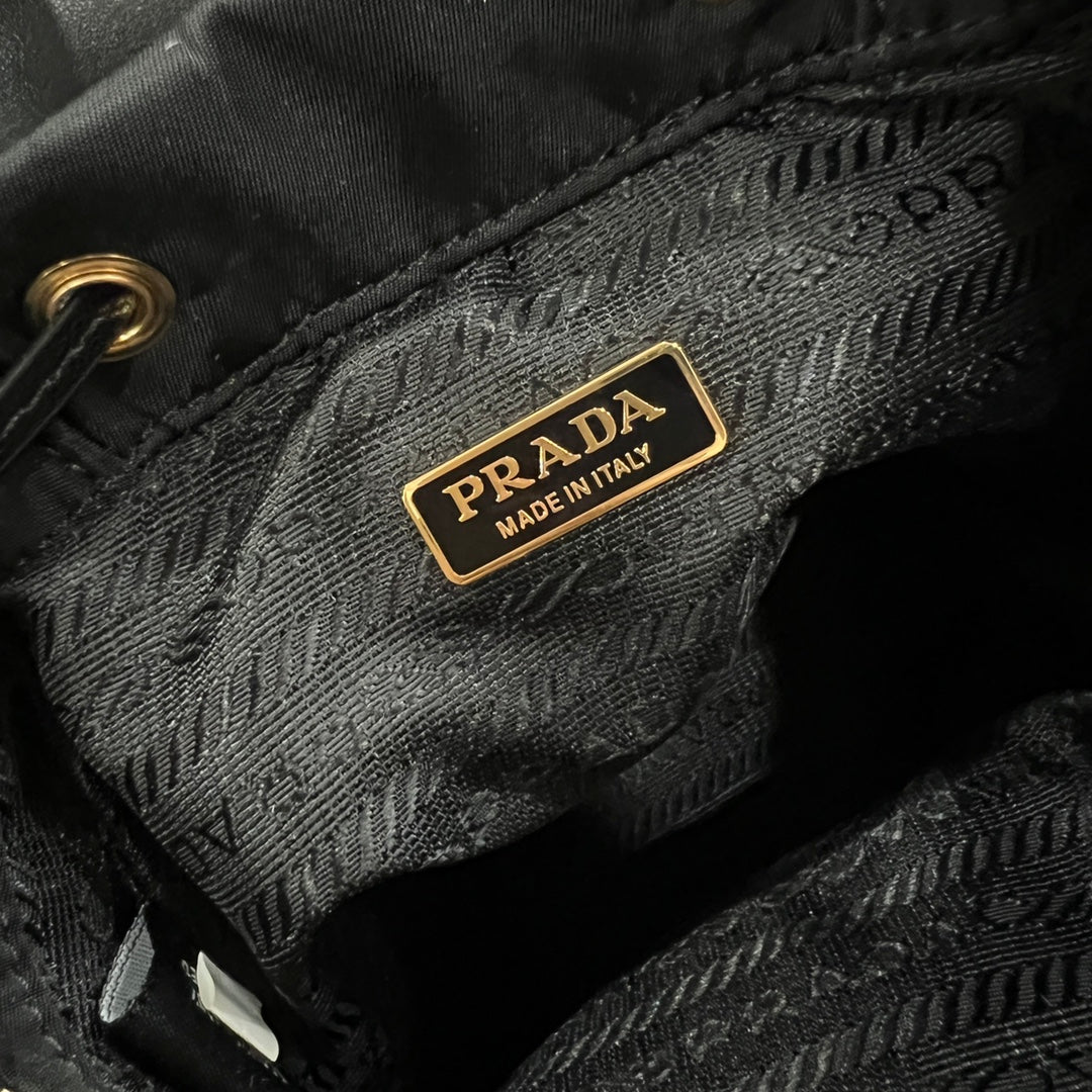 PRADA MINI BACKPACK 18 IN BLACK RE-NYLON AND GLOSSY CALFSKIN GOLD HARDWARE